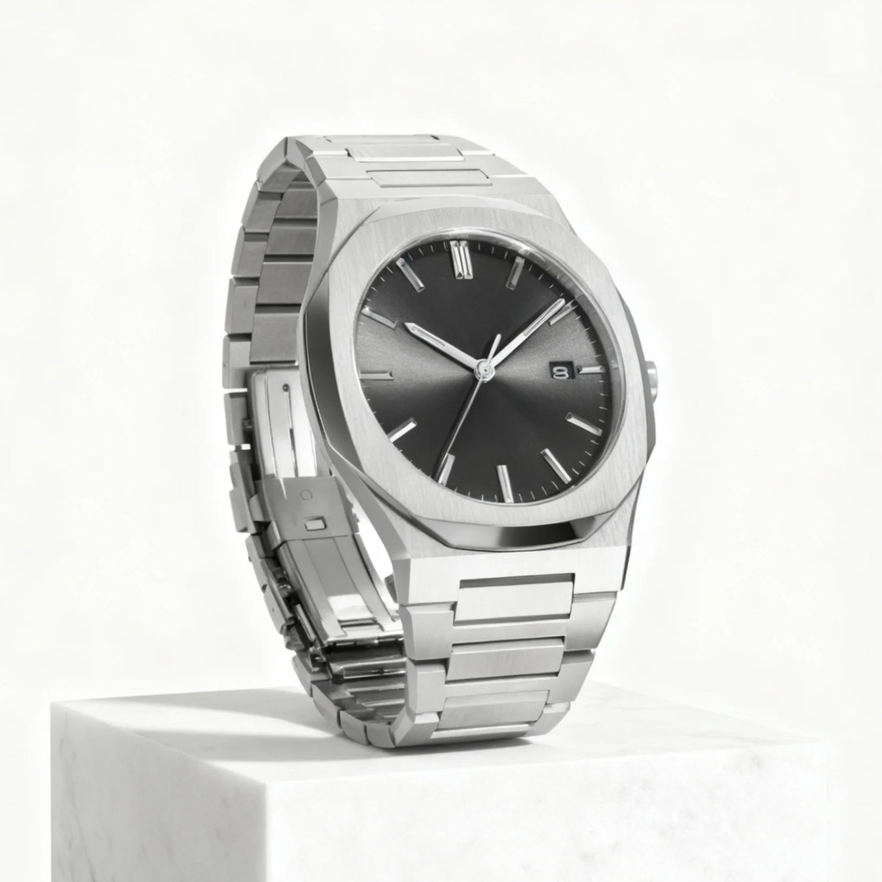 Side angle of MIDNIGHT black dial men’s quartz watch on marble pedestal